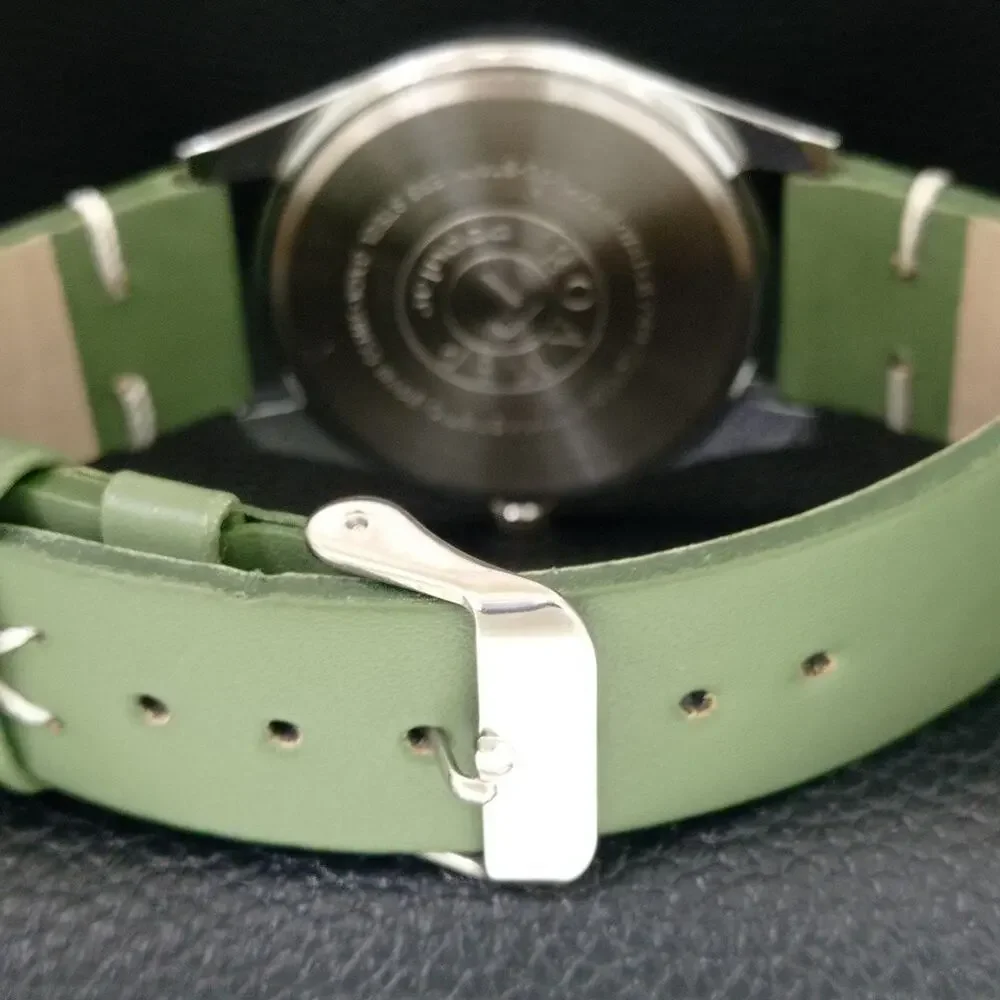 Vintage 1980 Roamer Manual Mens Silver Watch W/Leather Strap & Green accents